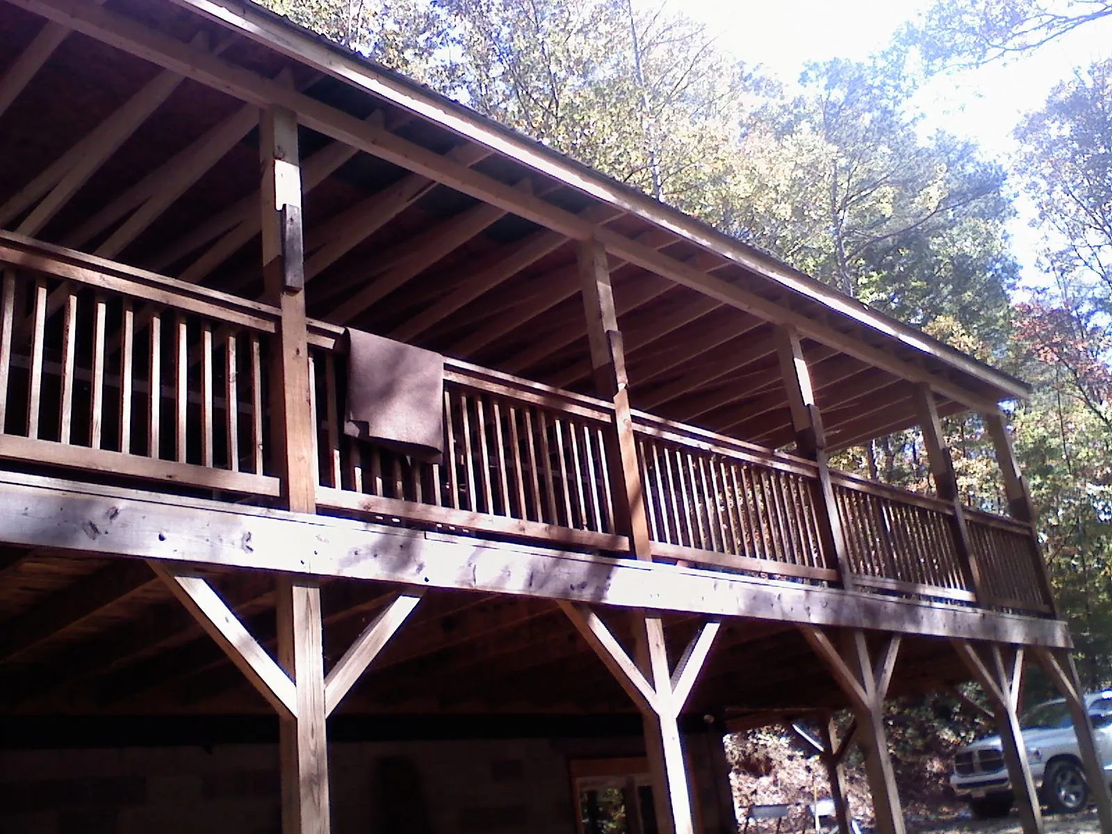 Timber framing under a new elevated porch and deck — Roof Leak Repair in Clay Center by Roofing Brothers